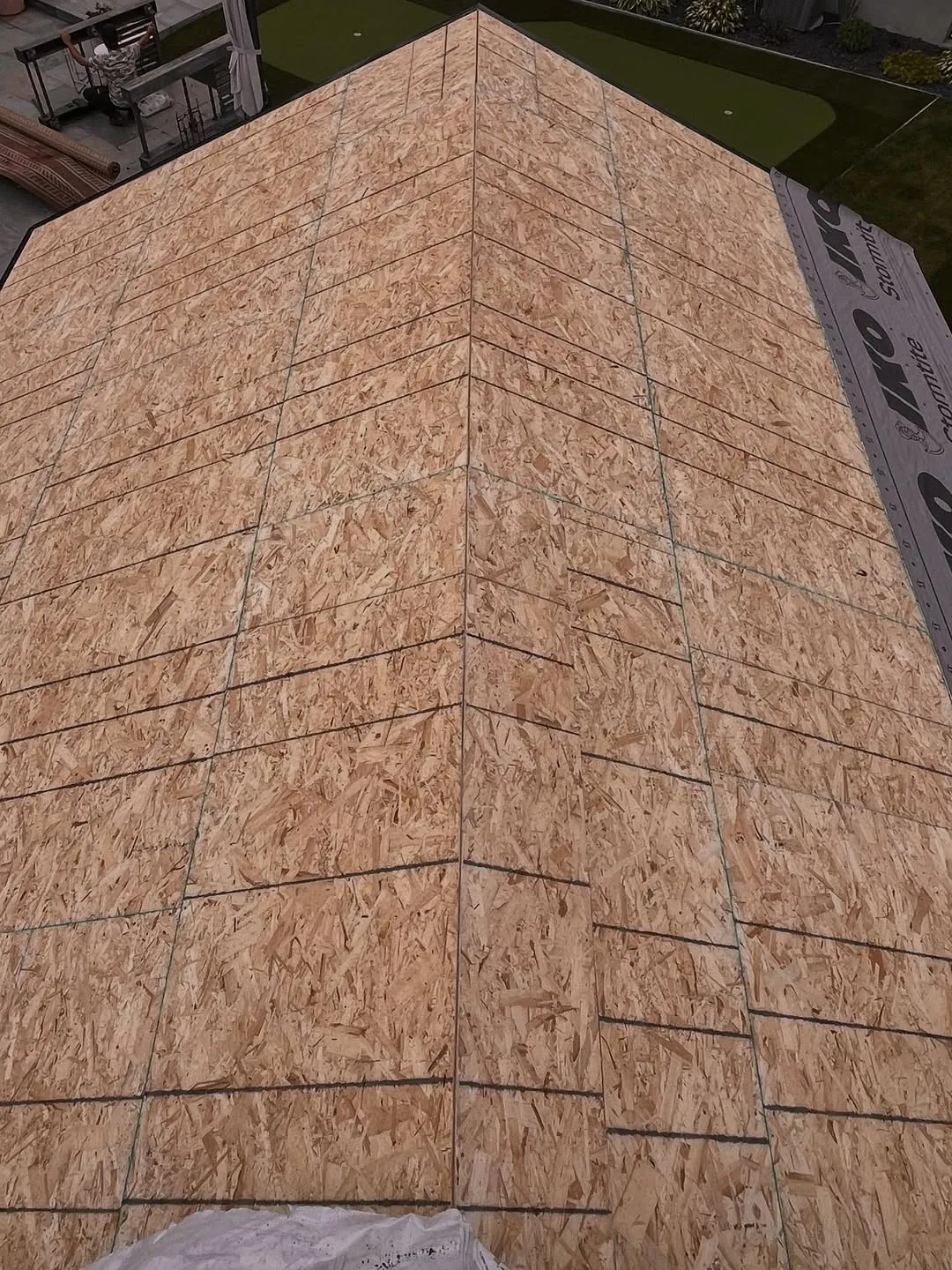 Outdoor Pavilion Roof Replacement - Ridge Cap Installation